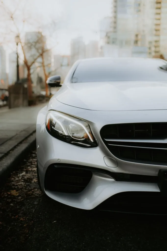 Front end of a late-model silver sedan
